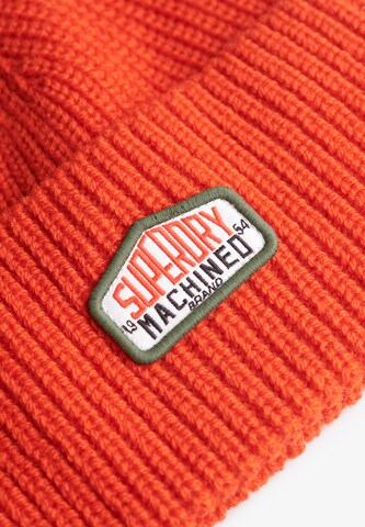 Superdry Muts in Oranje