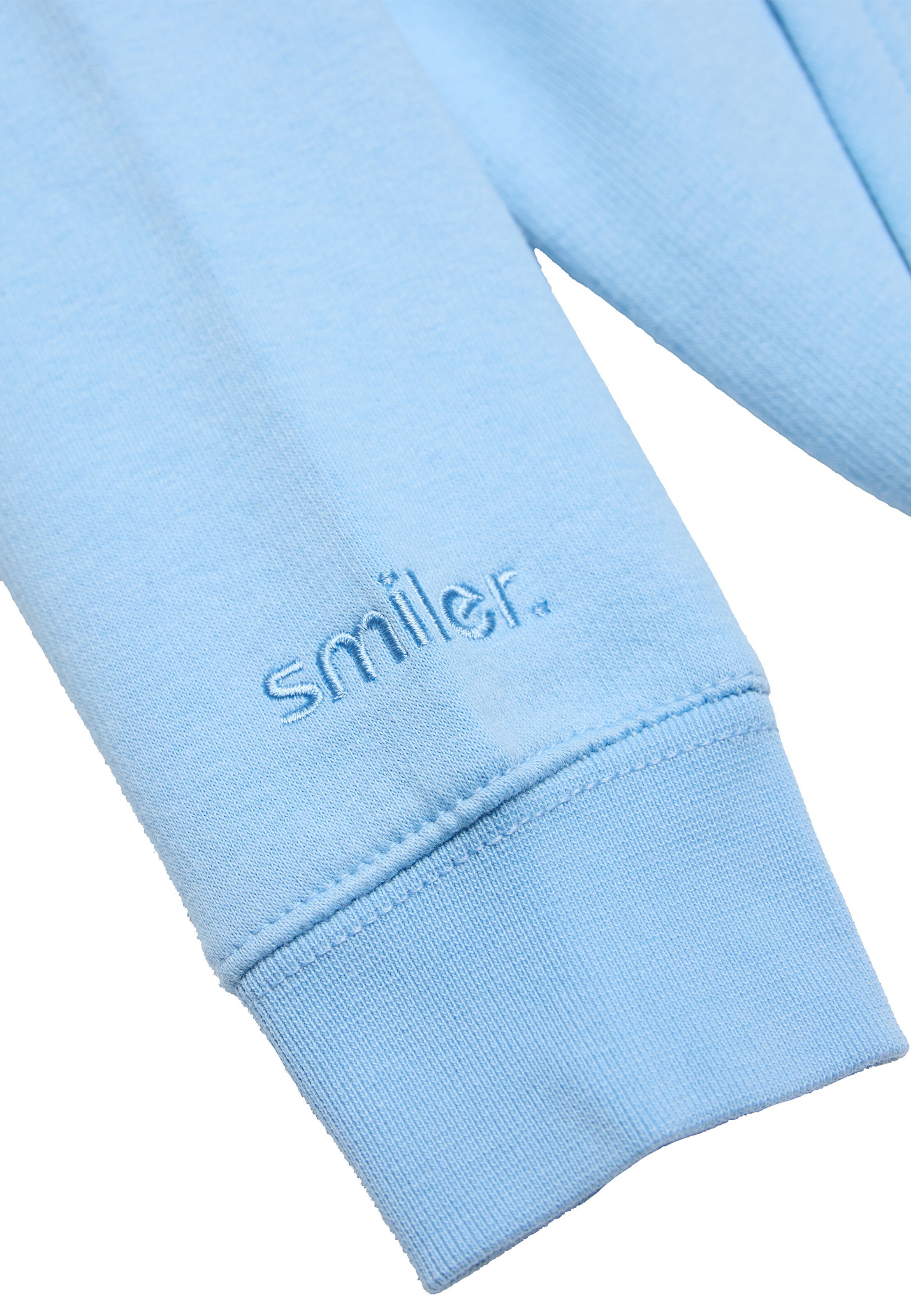 Veste de survêtement smiler. en bleu