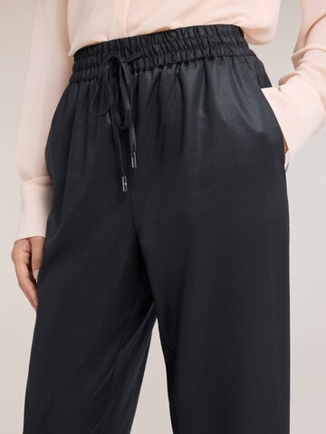 Regular Pantalon MOTIVI en noir