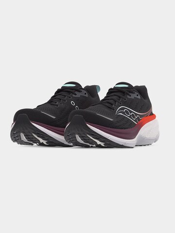 Chaussure de course saucony en noir