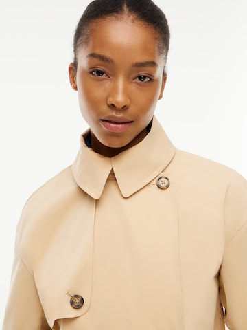 Tommy Jeans Välikausitakki värissä beige