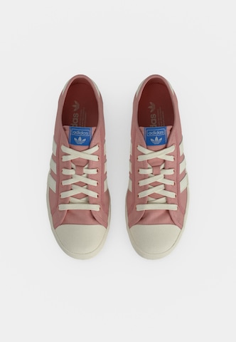 ADIDAS ORIGINALS Låg sneaker 'NISI' i lila