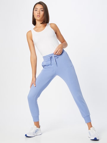 Tapered Pantaloni sportivi di 4F in blu