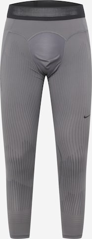 NIKE Skinny Fit Спортен панталон в сиво: отпред