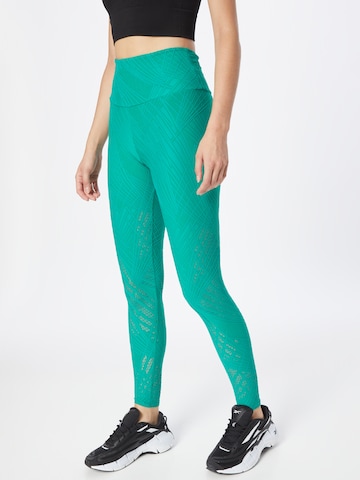 Skinny Pantaloni sportivi 'Selenite' di Onzie in verde: frontale