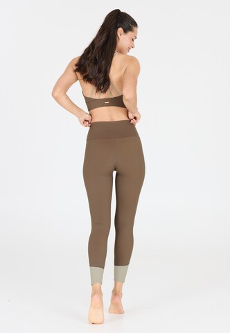 Athlecia Skinny Sports trousers 'Aspasia' in Brown