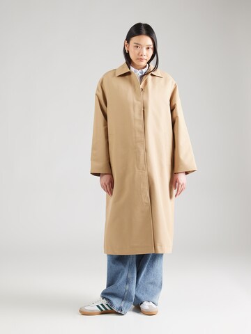 Tommy Jeans Between-seasons coat in Green: front