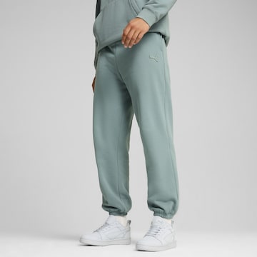 PUMA Tapered Sporthose in Grün