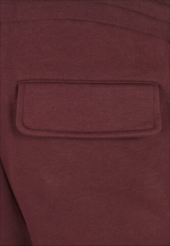 Urban Classics - Tapered Pantalón cargo en rojo