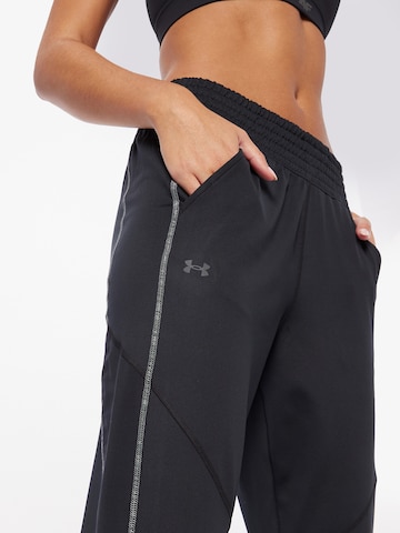 UNDER ARMOUR - Tapered Pantalón deportivo 'ColdGear' en negro