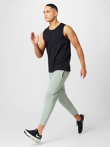 NIKE Tapered Sportbroek in Groen