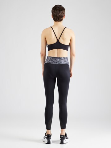 Reebok - Skinny Pantalón deportivo en negro