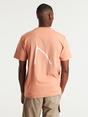 CHASIN' Shirt 'Swirl' in Oranje