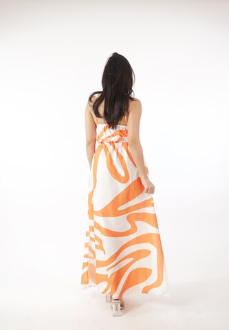 Elara Kjole i orange