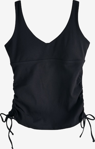 Top di self. in nero: frontale