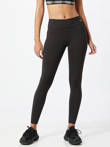 PUMA Skinny Workout Pants in Black: front