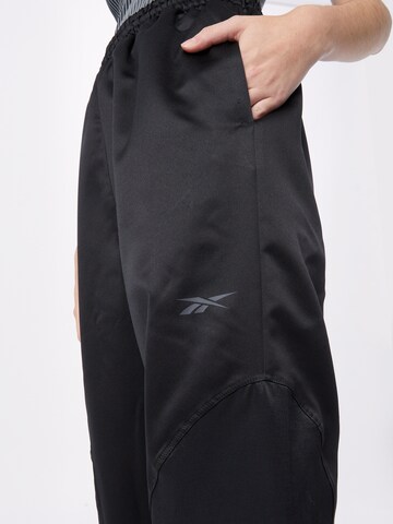 Effilé Pantalon de sport 'Tech-Style' Reebok en noir