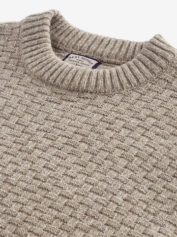 Next Sweter w kolorze beżowy