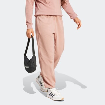 ADIDAS SPORTSWEAR Tapered Sportnadrágok 'Essentials' - rózsaszín