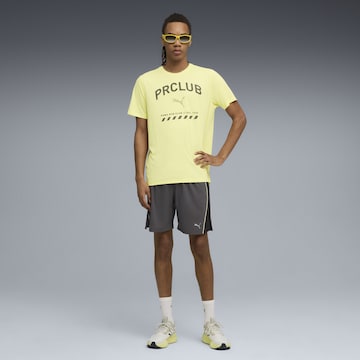 PUMA Funktionsshirt 'Run Club' in Gelb