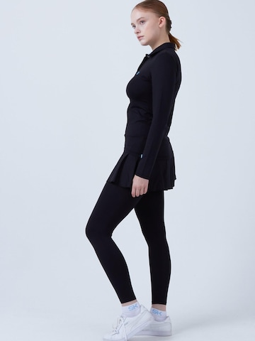 SPORTKIND Funktionsshirt 'Poloshirt Langarm'‌‌‌‌‌‌ in Schwarz