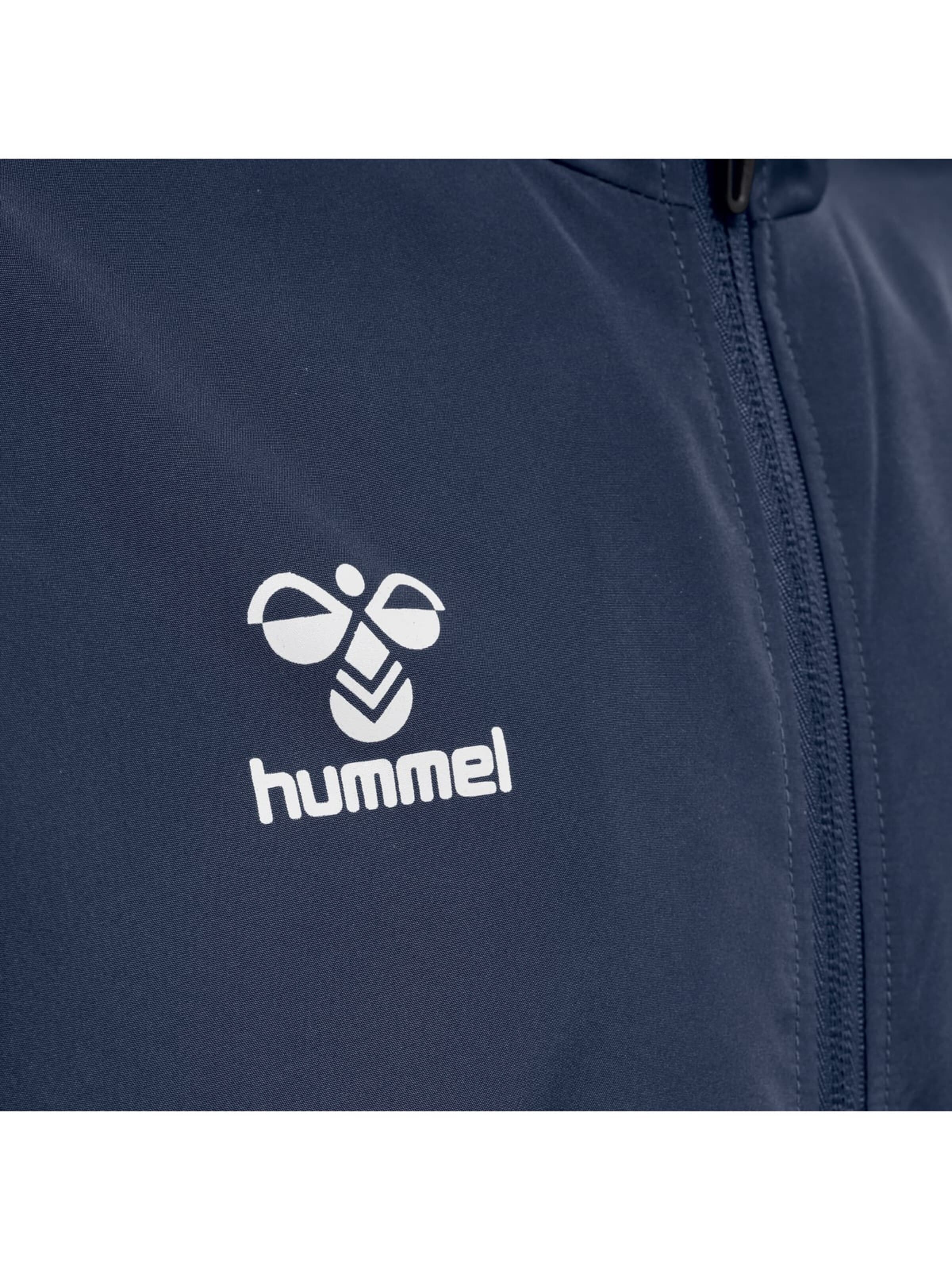 Veste de sport 'hmlCORE XK MICRO ZIP JACKET KIDS' Hummel en bleu