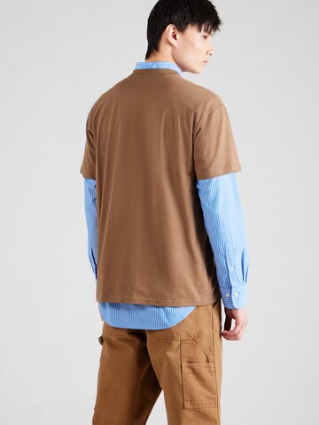 Carhartt WIP - Camiseta 'Greatest Flicks' en marrón