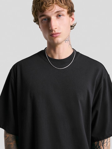 Bershka Bluser & t-shirts i sort