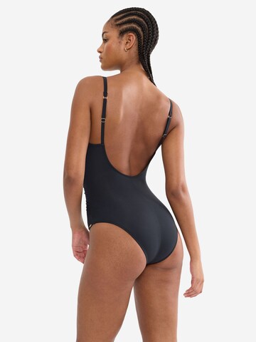 TRIUMPH Badeanzug ' Red Label Summer Twist ' in Schwarz