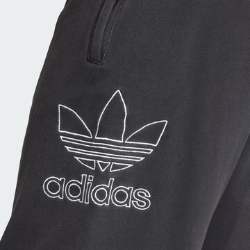 ADIDAS ORIGINALS Loosefit Housut 'Adicolor Outline Trefoil' värissä musta