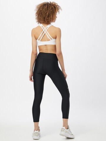 UNDER ARMOUR Skinny Sportbroek in Zwart