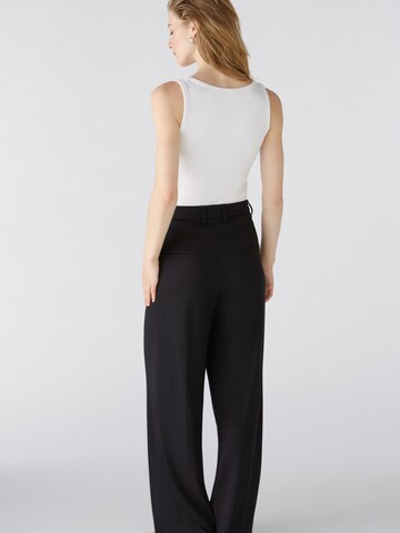 OUI Loosefit Bundfaltenhose in Schwarz