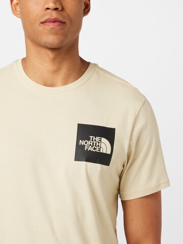 THE NORTH FACE - Ajuste regular Camiseta 'FINE' en beige