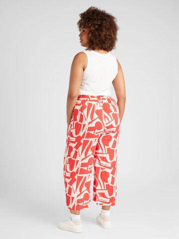 Tapered Pantaloni cutați 'CARNOVA LIFE' de la ONLY Carmakoma pe roșu