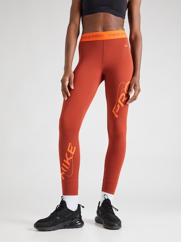 NIKE Скинни Спортивные штаны в Оранжевый: спереди