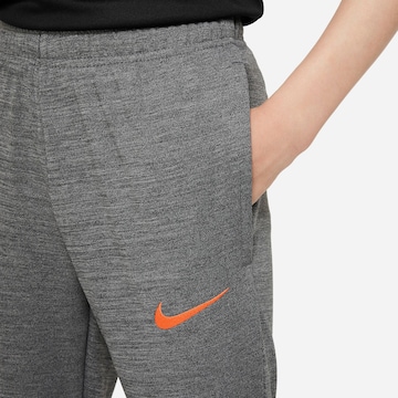 NIKE Skinny Sporthose in Grau