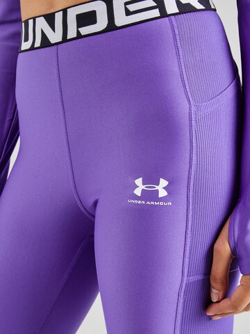 UNDER ARMOUR Skinny Spodnie sportowe w kolorze fioletowy