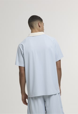 Maglietta 'Heritage' di Karl Kani in blu