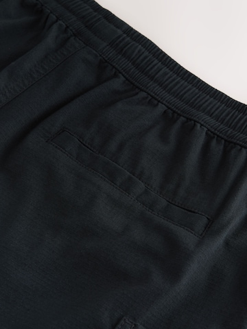 Regular Pantalon cargo Next en noir