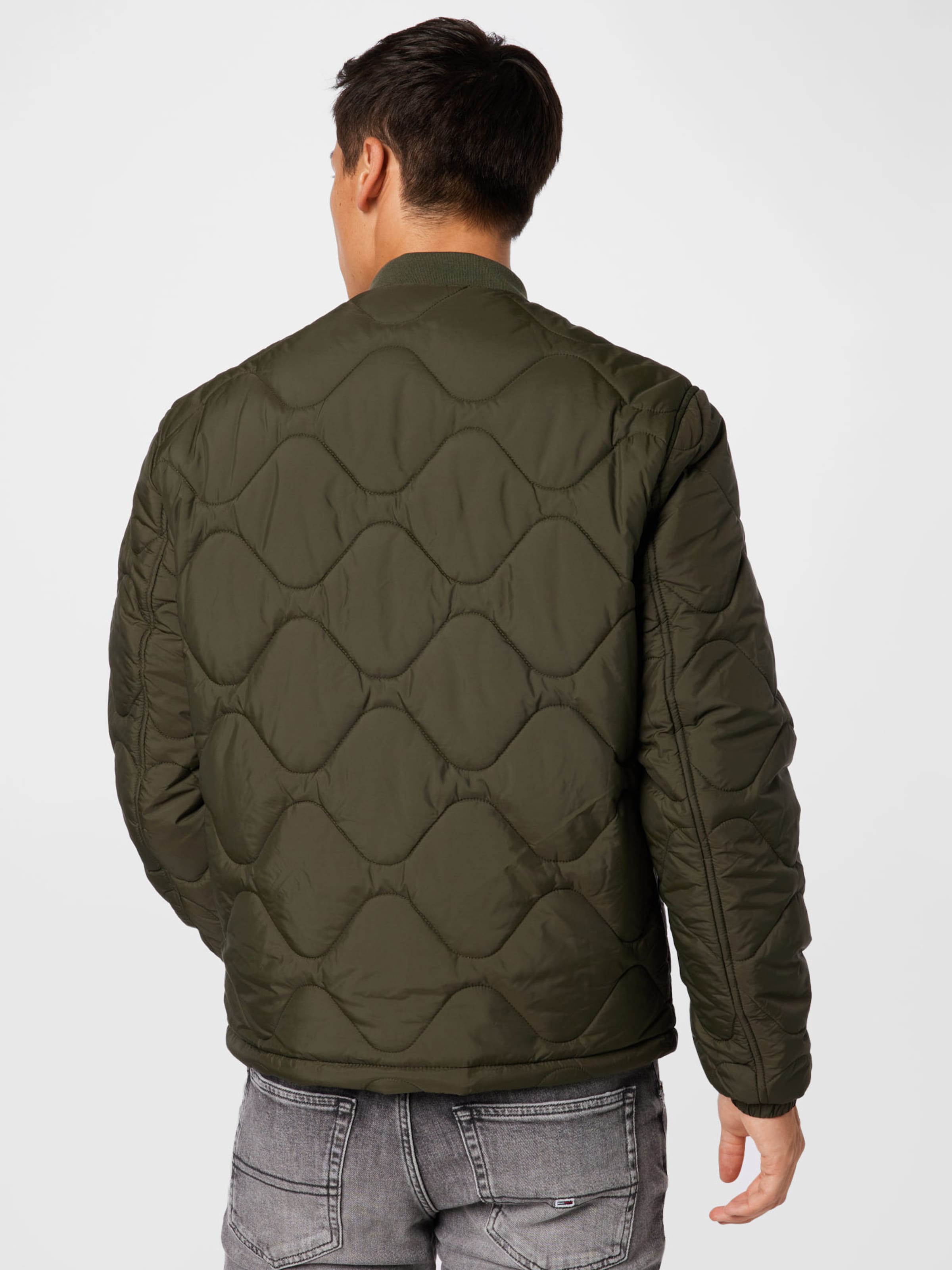Männer Jacken Tommy Jeans Jacke in Oliv - JN86769 Männer Jacken Tommy Jeans Jacke in Oliv - JN86769
