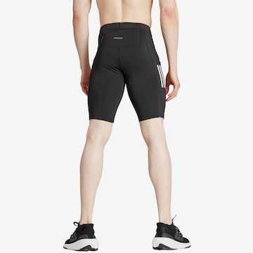 ADIDAS PERFORMANCE Skinny Urheiluhousut 'OWN THE RUN' värissä musta