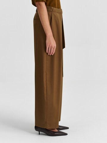 Wide leg Pantaloni con pieghe 'Anaiso' di TATUUM in verde