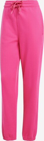 Tapered Pantaloni sportivi di ADIDAS BY STELLA MCCARTNEY in rosso: frontale