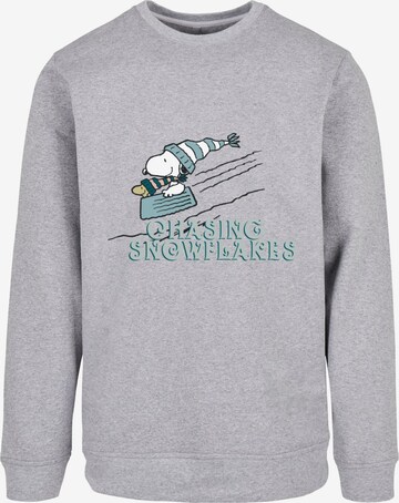 Sweat-shirt 'Peanuts Chasing Snowflakes' Merchcode en gris : devant