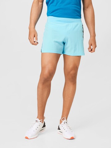 UNDER ARMOUR Regular Workout Pants 'Speedpocket' in Blue: front