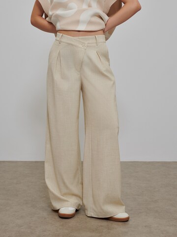 florence by mills exclusive for ABOUT YOU Wide leg Pleat-front trousers 'Foliage' in Beige: front