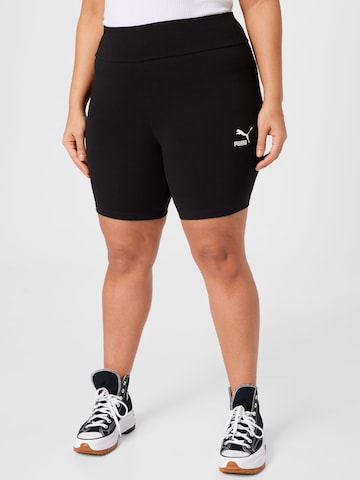 PUMA Skinny Pants in Black: front