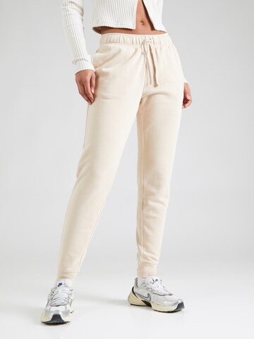 Nike Sportswear Zwężany krój Spodnie 'Club' w kolorze beżowy: przód