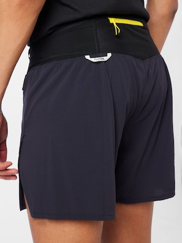 ASICS Slimfit Spodnie sportowe 'FUJITRAIL' w kolorze czarny