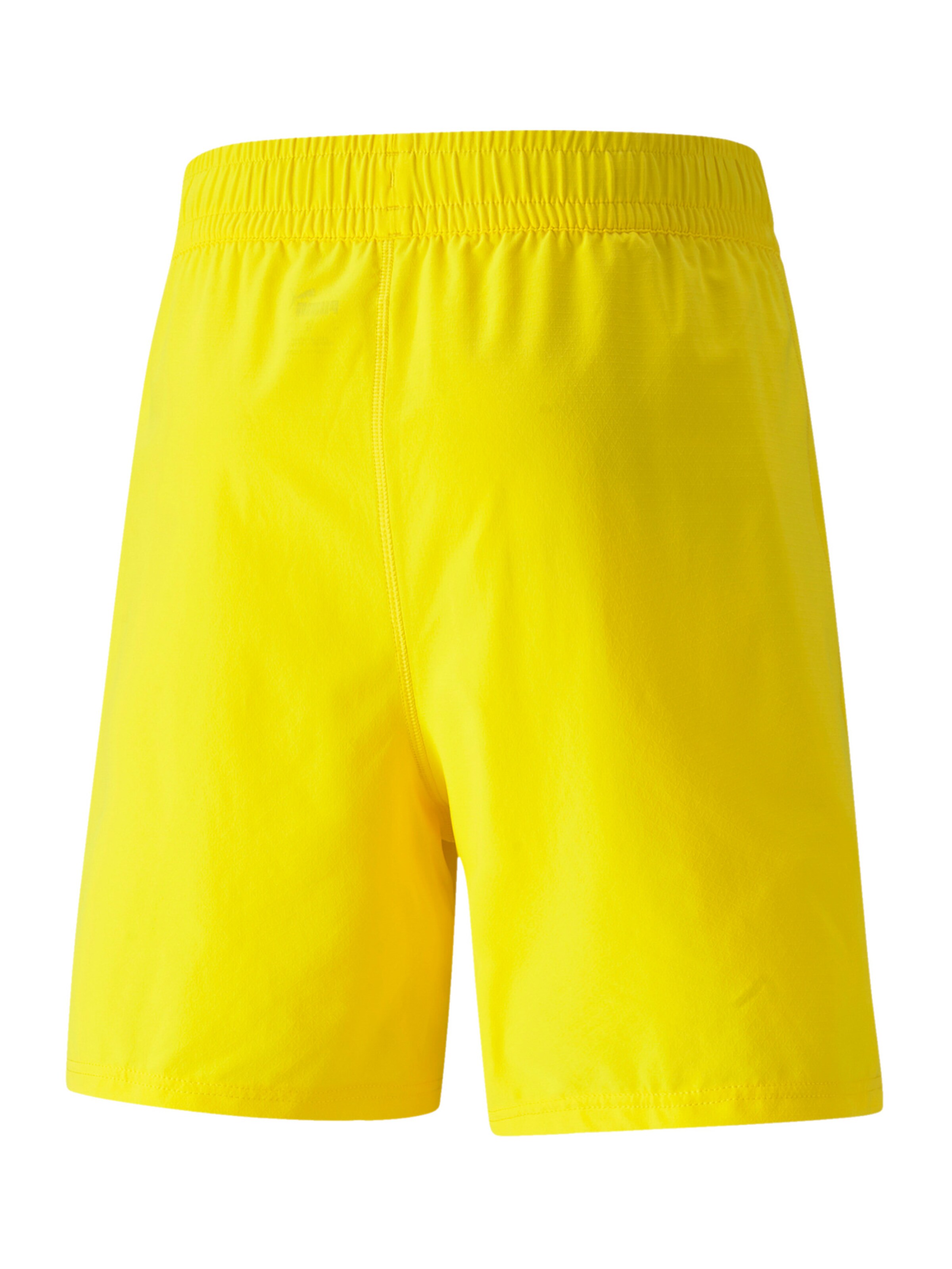 PUMA Regular Workout Pants in Yellow